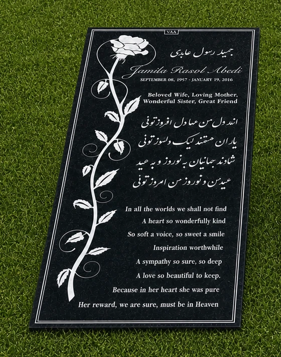 Ledger-size black granite flat marker on grass